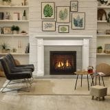 Stylish living room interior with comfortable chairs and decorative fireplace