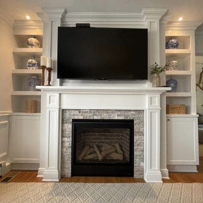 Majestic Quartz Platinum Gas Fireplace with a Cultured Stone Surround