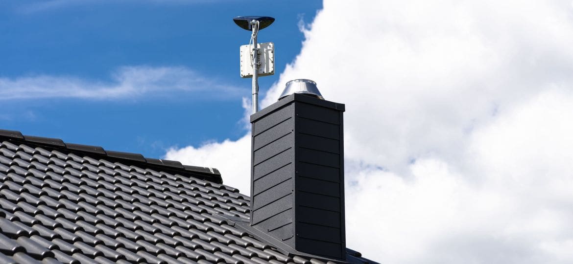 Antenna amplifier for home mobile Internet and a TV receiver mounted on the chimney.